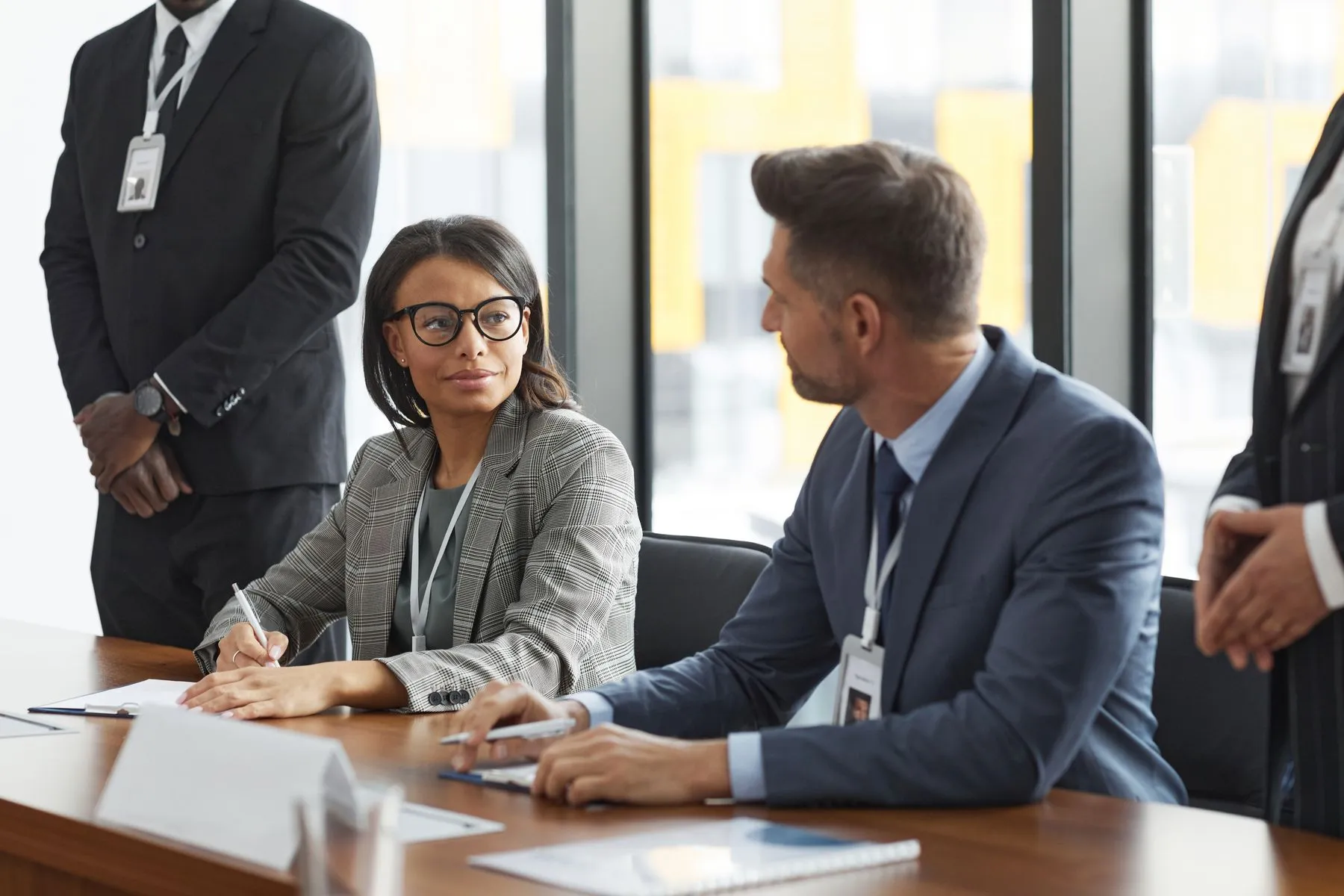 Advisors working through options with a client team
