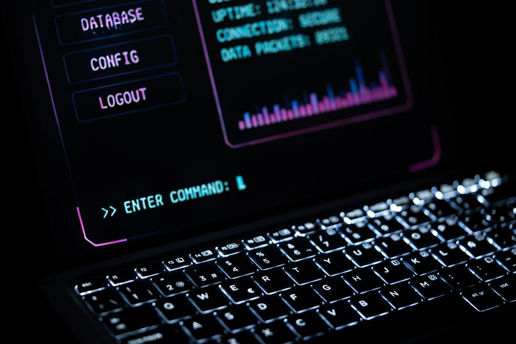 A terminal session open on a backlit keyboard at night